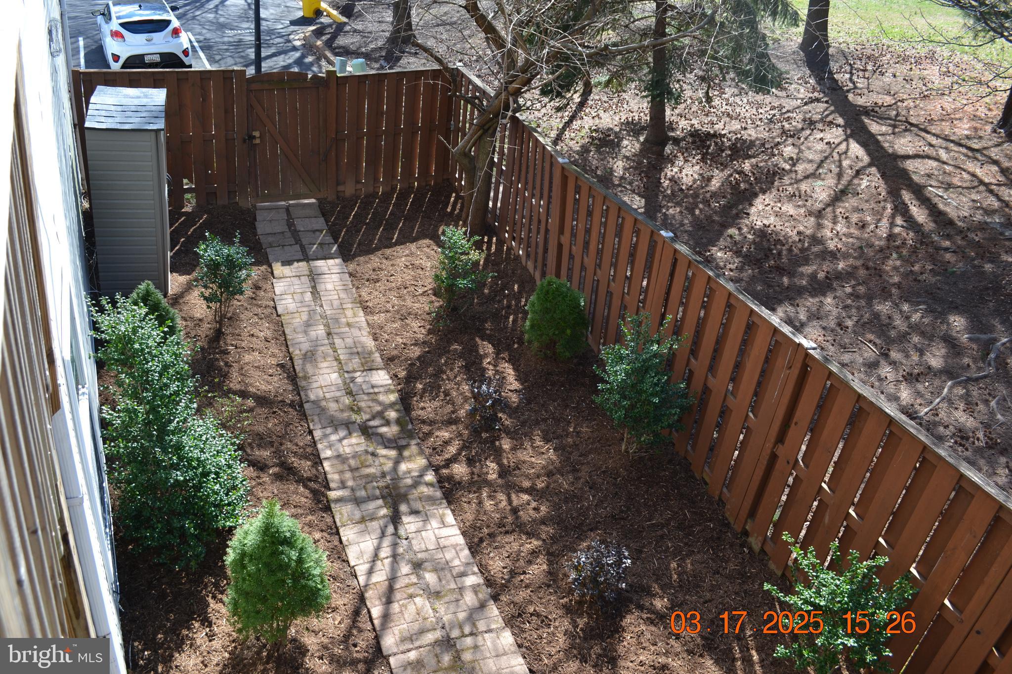 1302 Hill Born Drive Hanover, MD 21076 - Photo 5 of 31 a view of garden with wooden fence