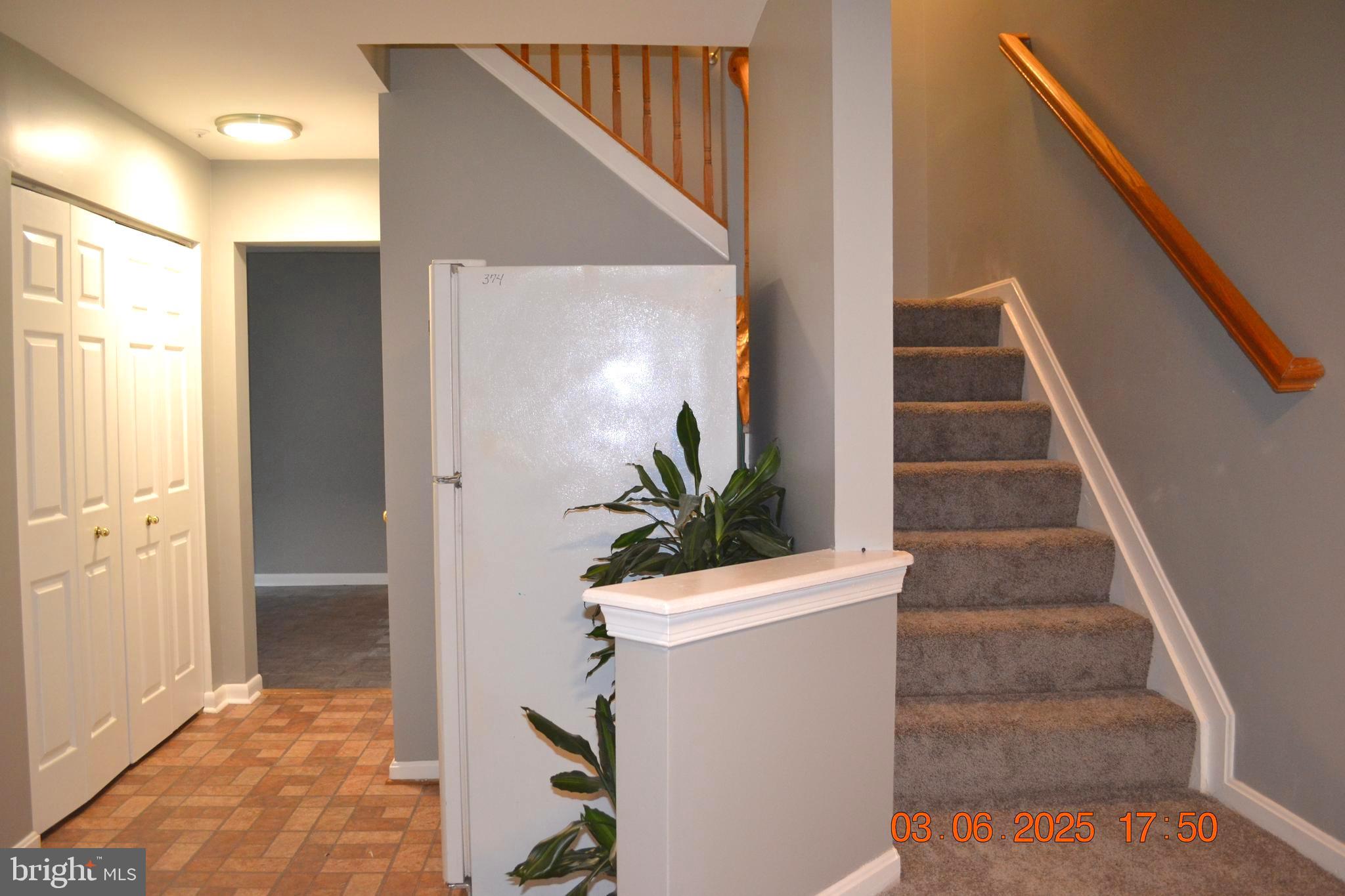 1302 Hill Born Drive Hanover, MD 21076 - Photo 6 of 31 a view of staircase with a potted plant