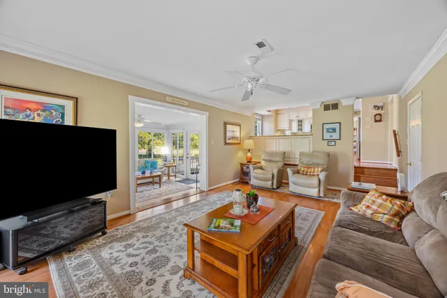 a room with furniture and a book shelf