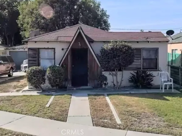 a view of house with outdoor space