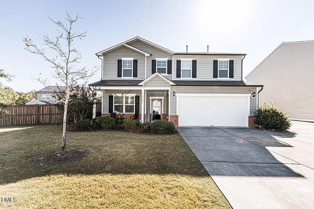 3425 Teravista Way Raleigh, NC 27616 - Photo 1 of 49 a front view of a house with yard