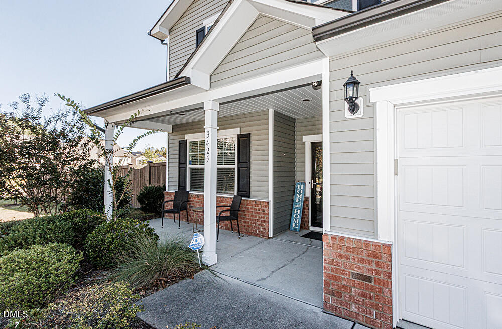 3425 Teravista Way Raleigh, NC 27616 - Photo 2 of 49 a porch with seating space