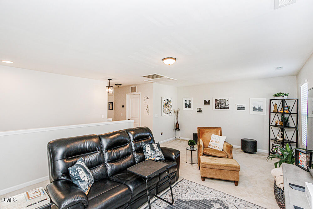 3425 Teravista Way Raleigh, NC 27616 - Photo 21 of 49 a living room with furniture