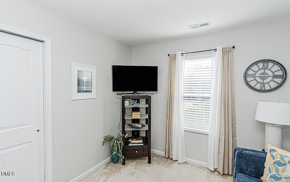 3425 Teravista Way Raleigh, NC 27616 - Photo 26 of 49 a view of a livingroom with furniture and a window
