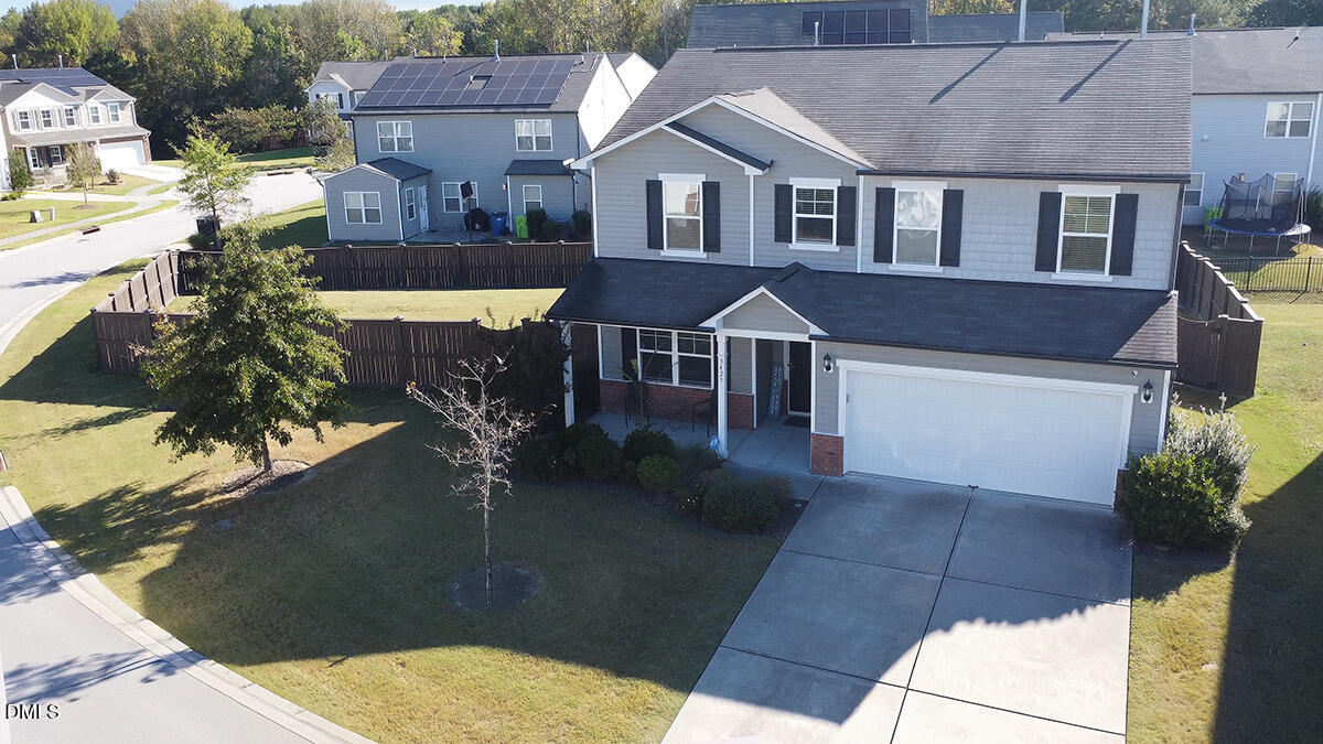 3425 Teravista Way Raleigh, NC 27616 - Photo 41 of 49 a front view of a house with a yard
