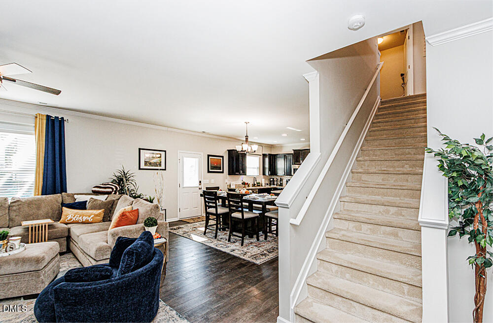 3425 Teravista Way Raleigh, NC 27616 - Photo 5 of 49 a living room with furniture and wooden floor