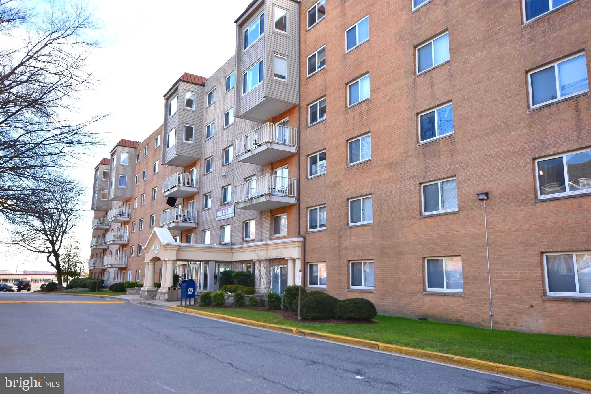 4313 Knox Road, Unit 501 College Park, MD 20740 - Photo 17 of 17 a front view of a building with garden