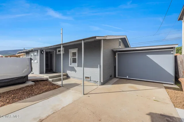 a view of backyard with cabin