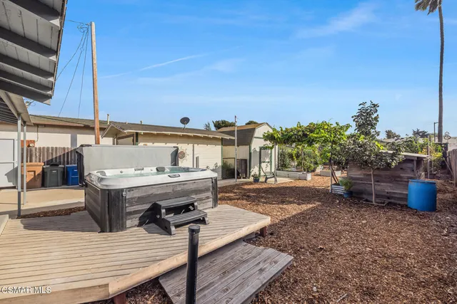 a view of a terrace with furniture and stove