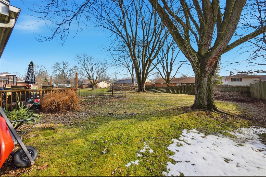 4780 Old Salem Road Englewood, OH 45322 - Photo 30 of 30 This spacious yard features mature trees and a private deck, perfect for outdoor enjoyment.
