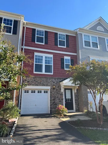 a view of a building with a yard