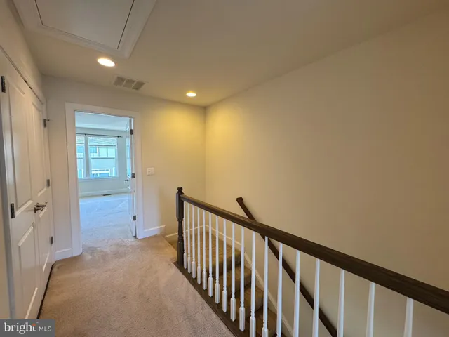 a view of hallway with livingroom