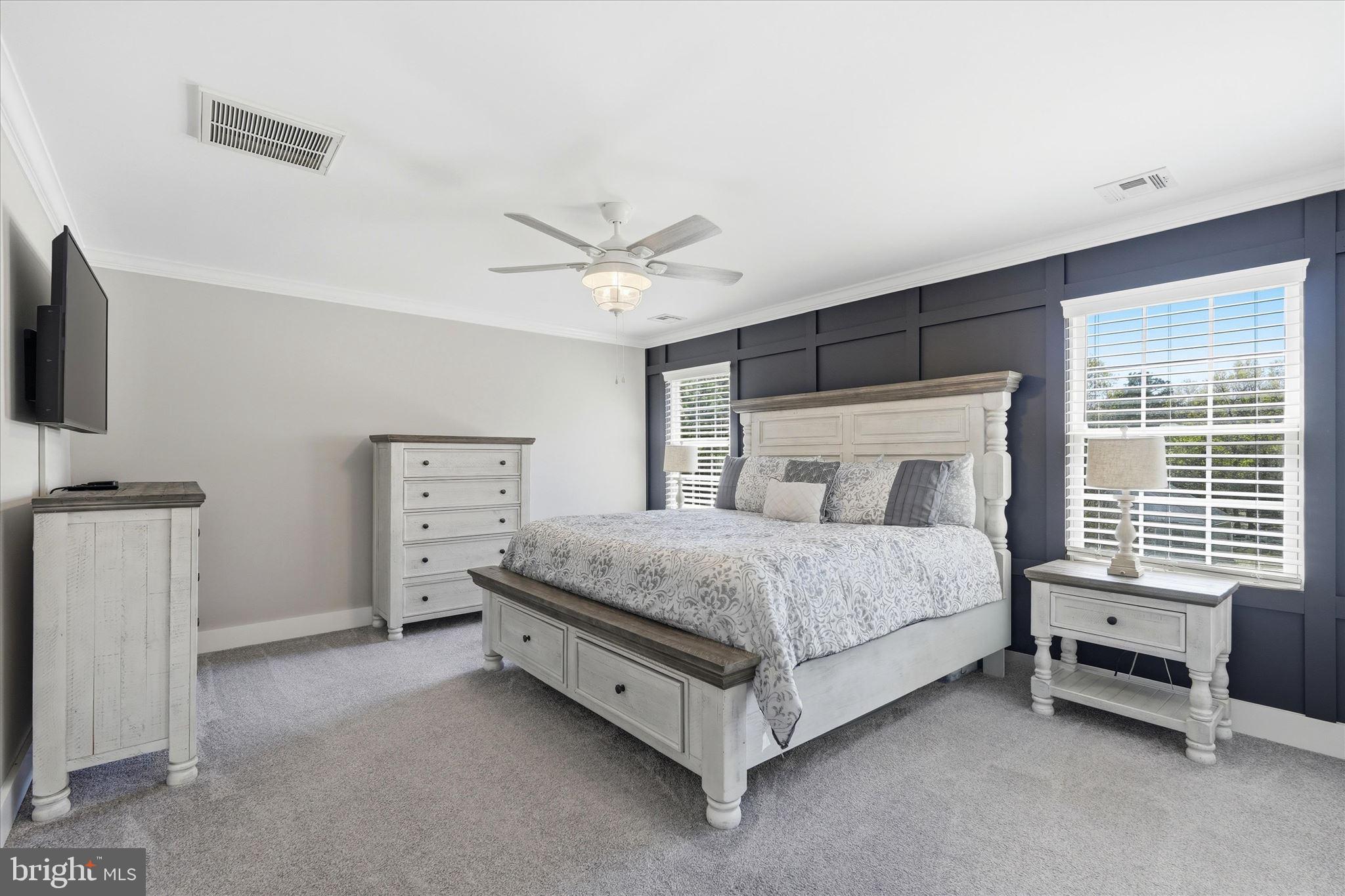 176 Warren Grove Road Barnegat, NJ 08005 - Photo 40 of 71 a bed room with a bed and a television