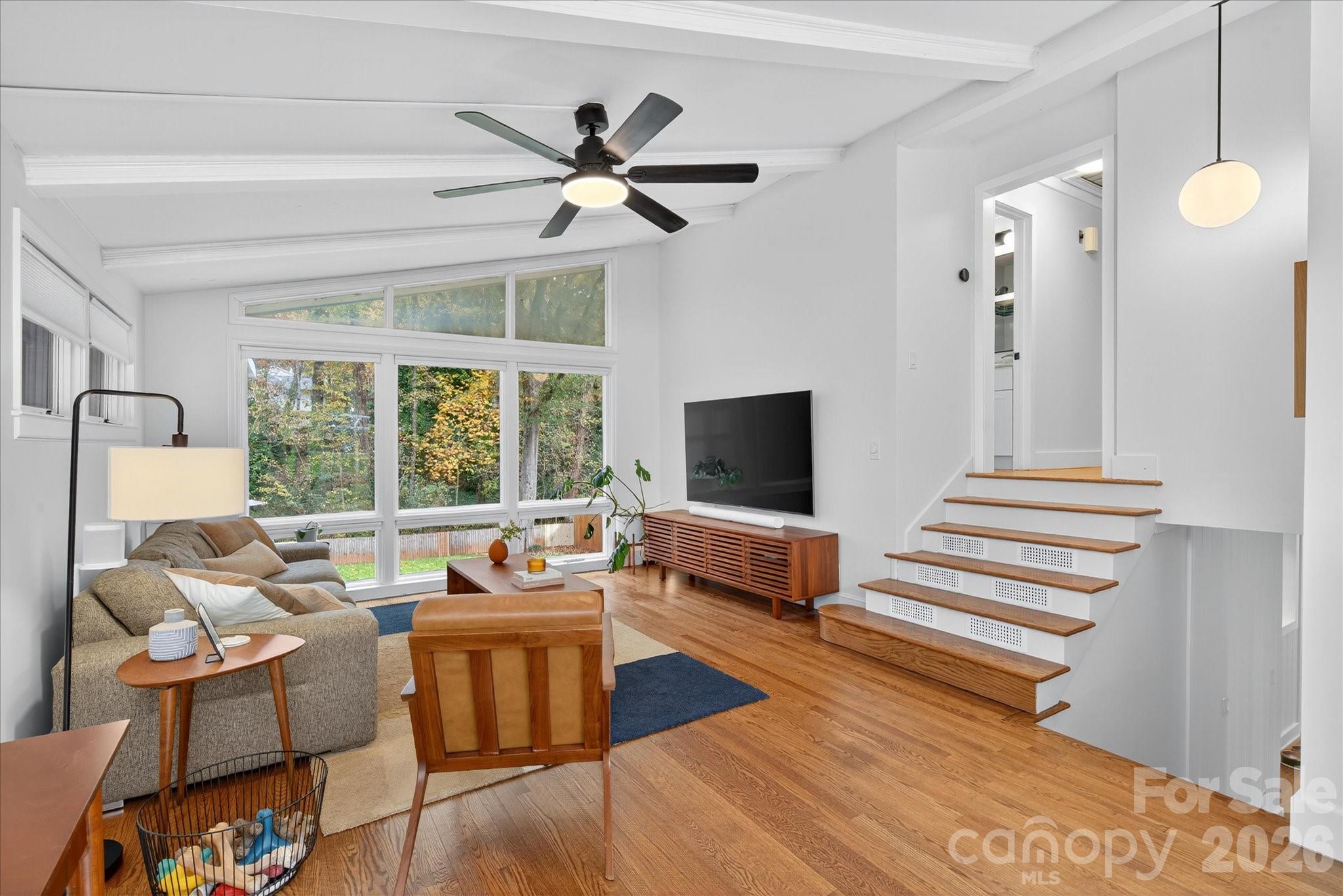6431 Rosecrest Drive Charlotte, NC 28210 - Photo 2 of 46 a living room with furniture and a flat screen tv