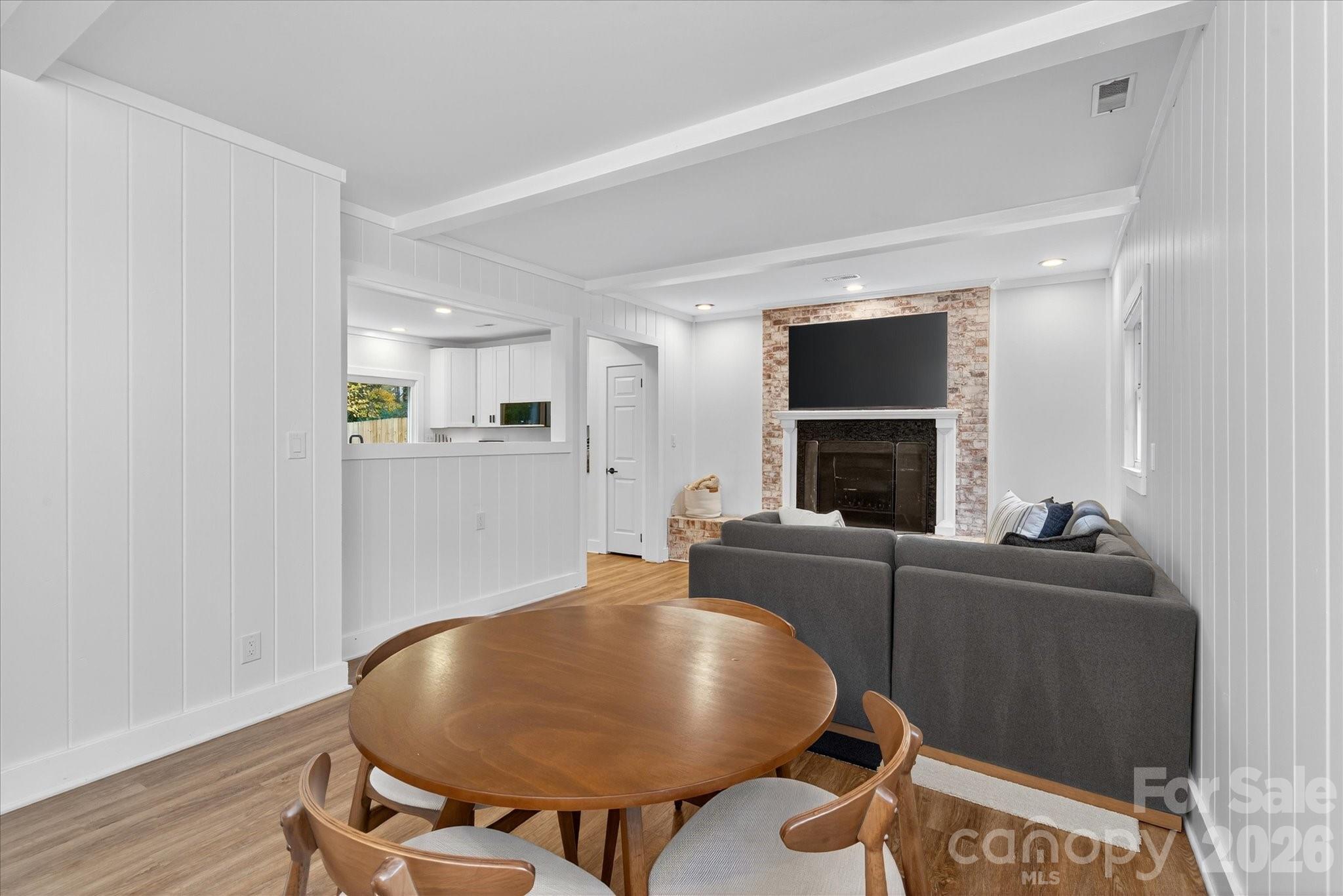 6431 Rosecrest Drive Charlotte, NC 28210 - Photo 21 of 46 a living room with furniture and a fireplace