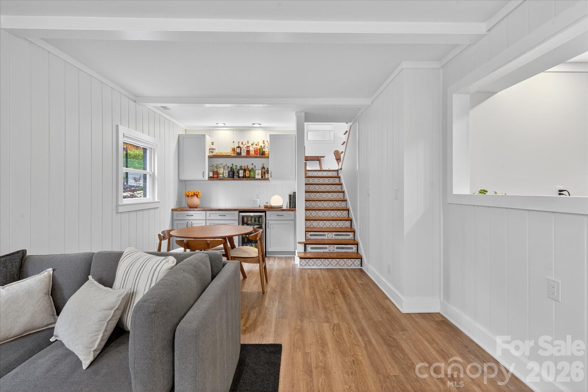 6431 Rosecrest Drive Charlotte, NC 28210 - Photo 24 of 46 a living room with furniture and wooden floor