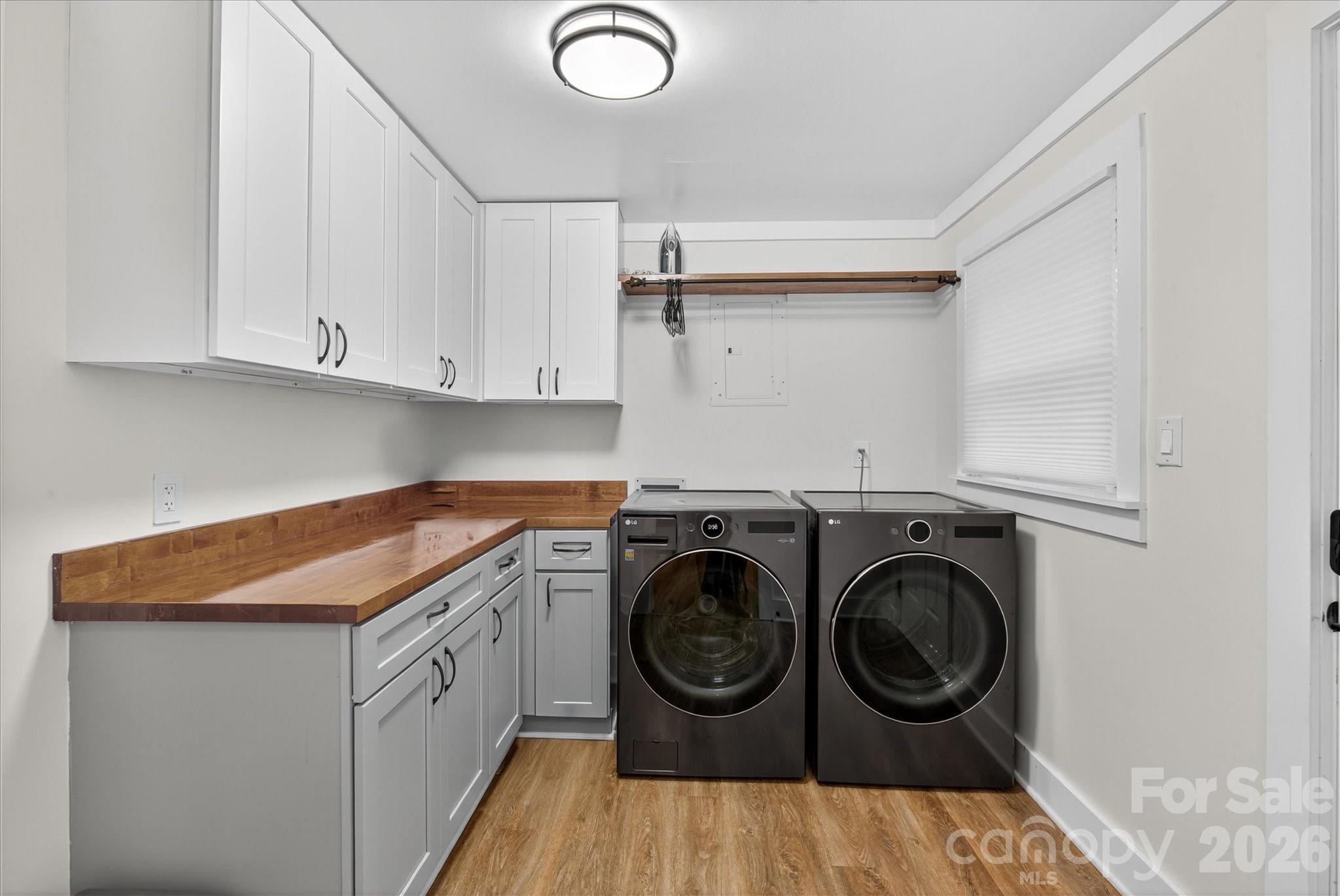 6431 Rosecrest Drive Charlotte, NC 28210 - Photo 32 of 46 a utility room with sink dryer and washer