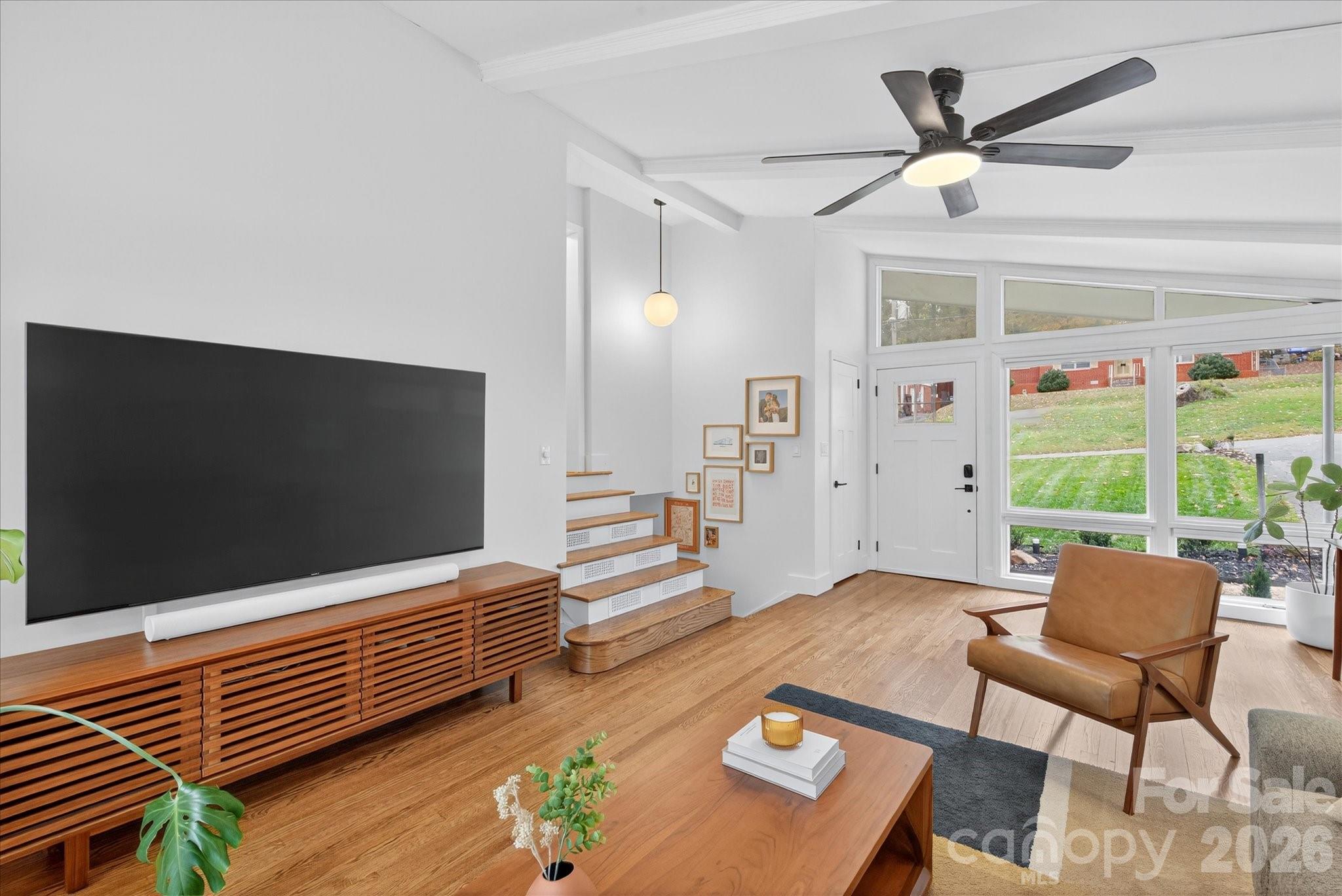 6431 Rosecrest Drive Charlotte, NC 28210 - Photo 6 of 46 a living room with furniture and a flat screen tv