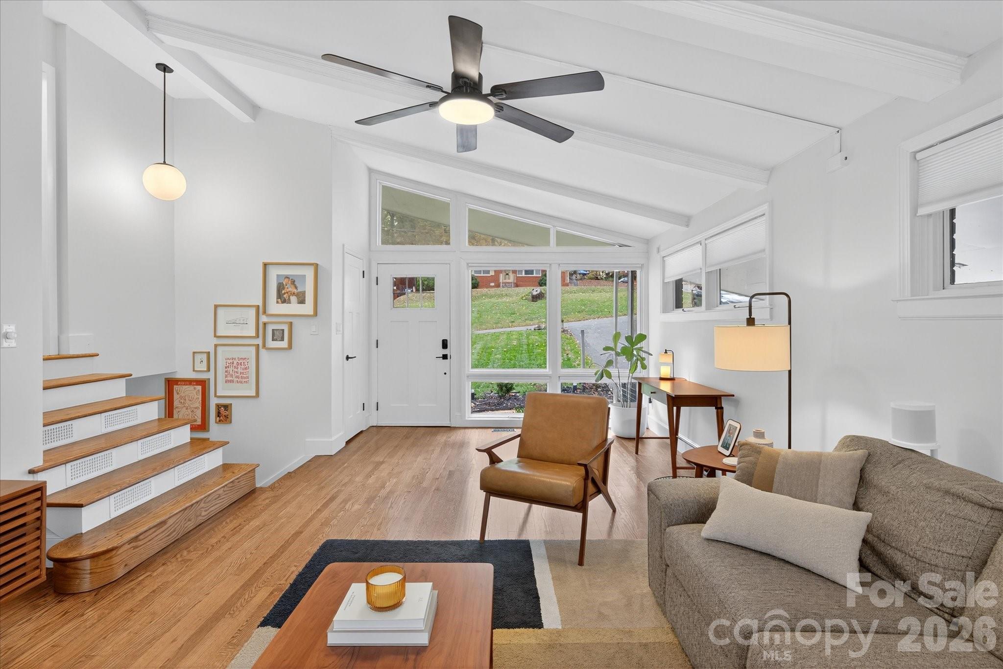 6431 Rosecrest Drive Charlotte, NC 28210 - Photo 7 of 46 a living room with furniture and a wooden floor