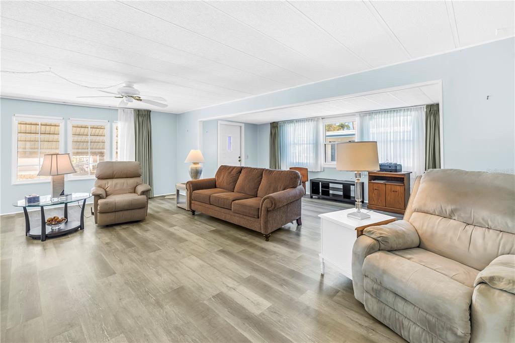 1100 South Belcher Road, Unit 502 Largo, FL 33771 - Photo 4 of 51 a living room with furniture and a couch