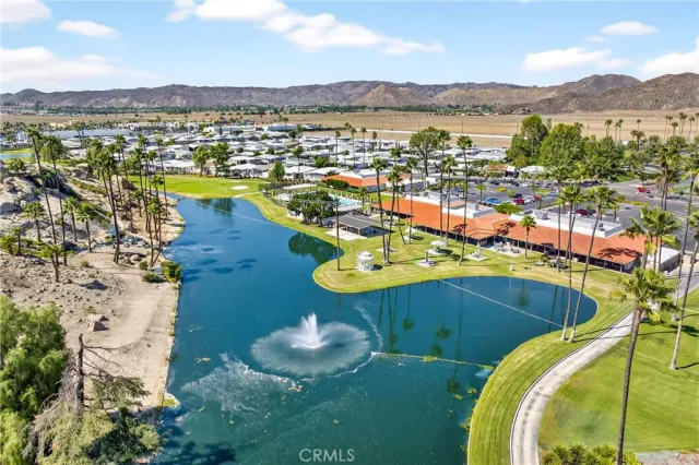 an aerial view of a house with a ocean view