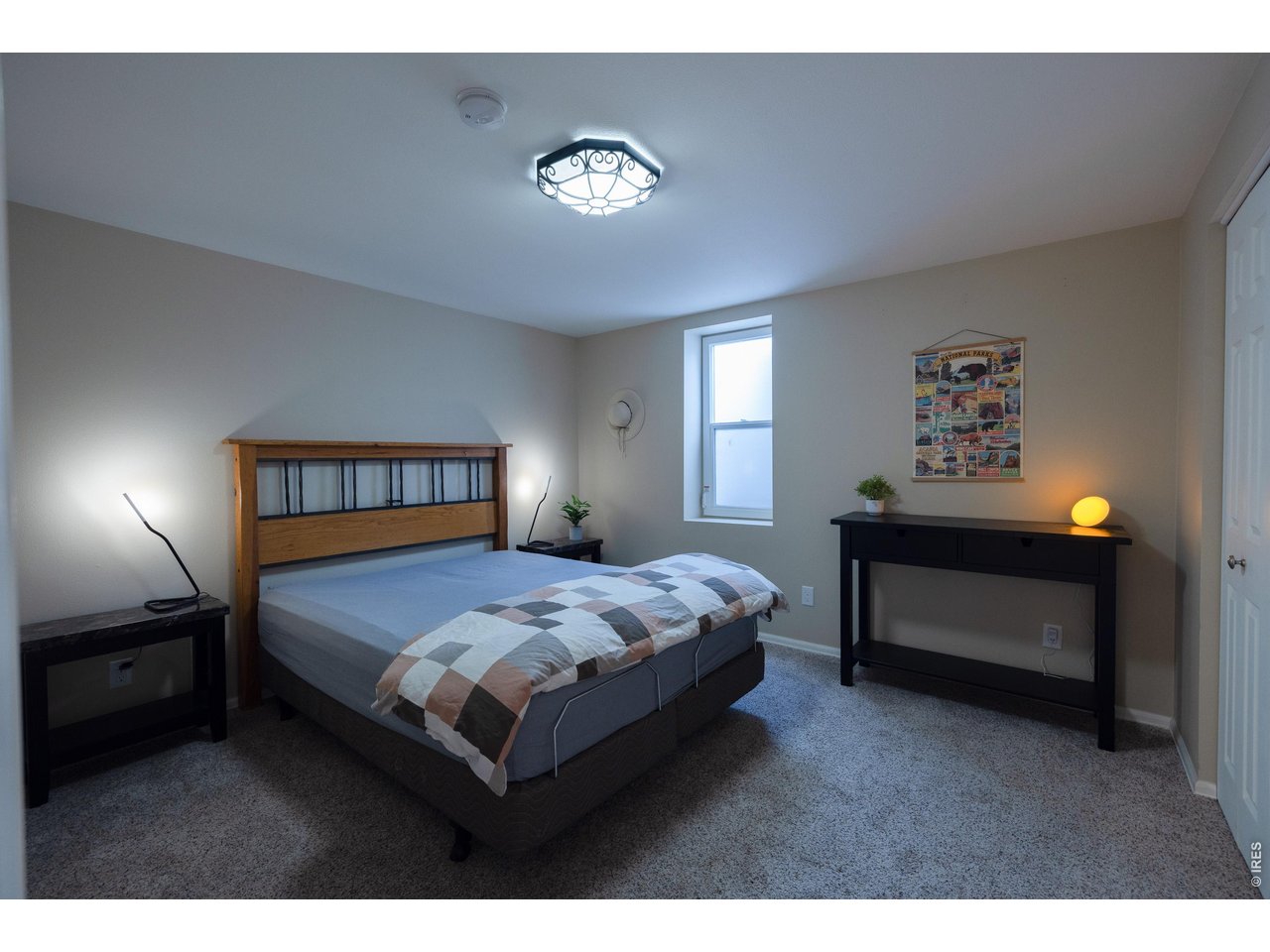 3320 23rd Street Boulder, CO 80304 - Photo 15 of 25 A quiet lower-level retreat with egress window and an oversized walk-in closet for added comfort and storage.