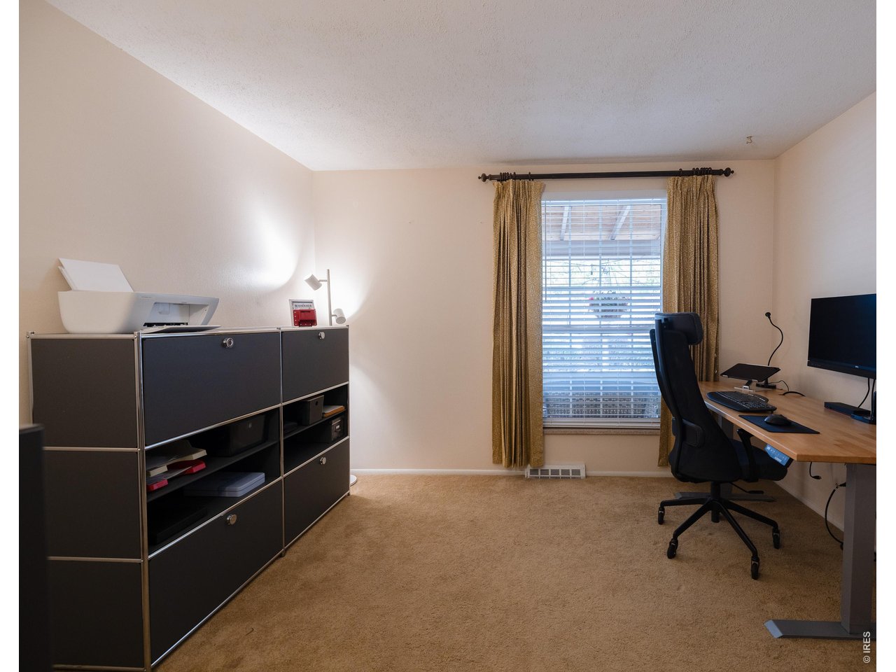 3320 23rd Street Boulder, CO 80304 - Photo 18 of 25 Bright main-level bedrooms with large windows.