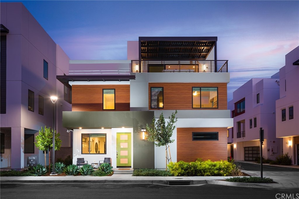 82 Ballast Point Tustin, CA 92782 - Photo 1 of 30 a front view of a house with a yard