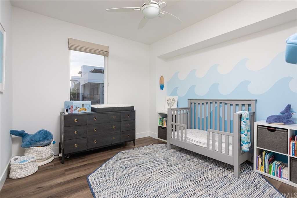 82 Ballast Point Tustin, CA 92782 - Photo 12 of 30 a bed room with furniture and a window