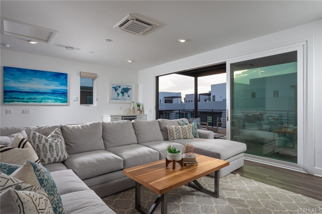 82 Ballast Point Tustin, CA 92782 - Photo 18 of 30 a living room with furniture and a large window