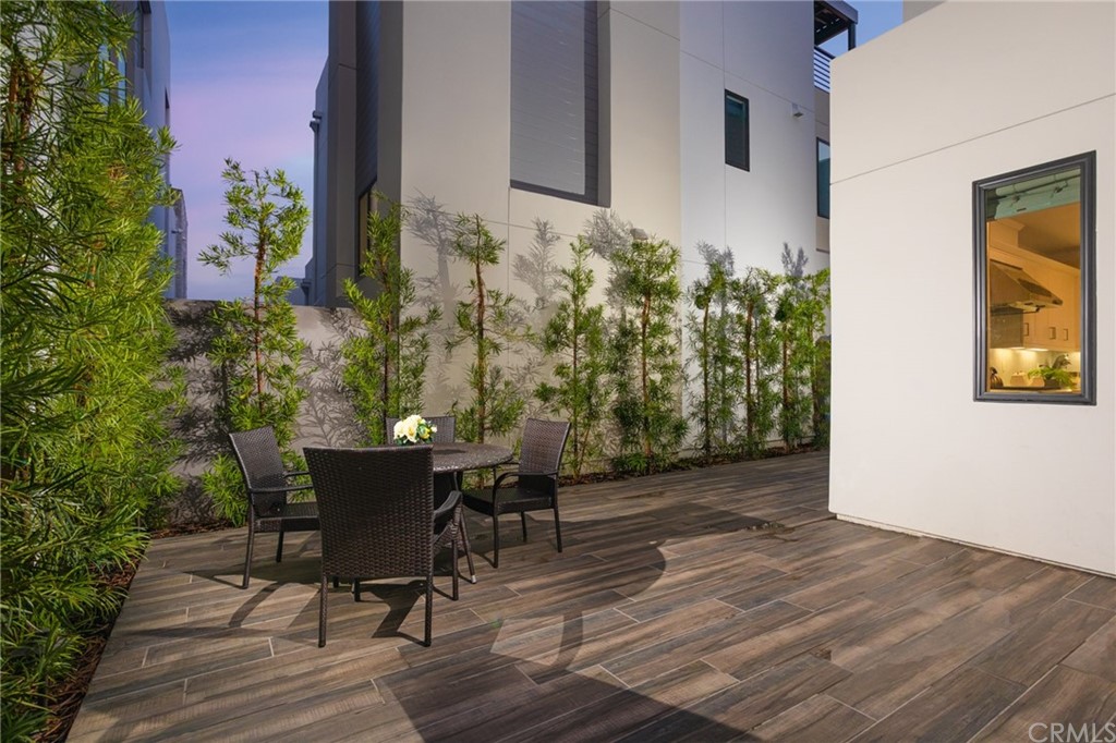 82 Ballast Point Tustin, CA 92782 - Photo 22 of 30 a view of a house with backyard and sitting area