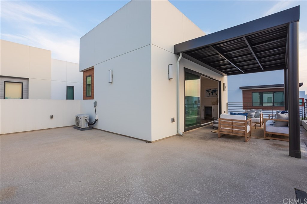 82 Ballast Point Tustin, CA 92782 - Photo 24 of 30 a view of livingroom with furniture and white walls