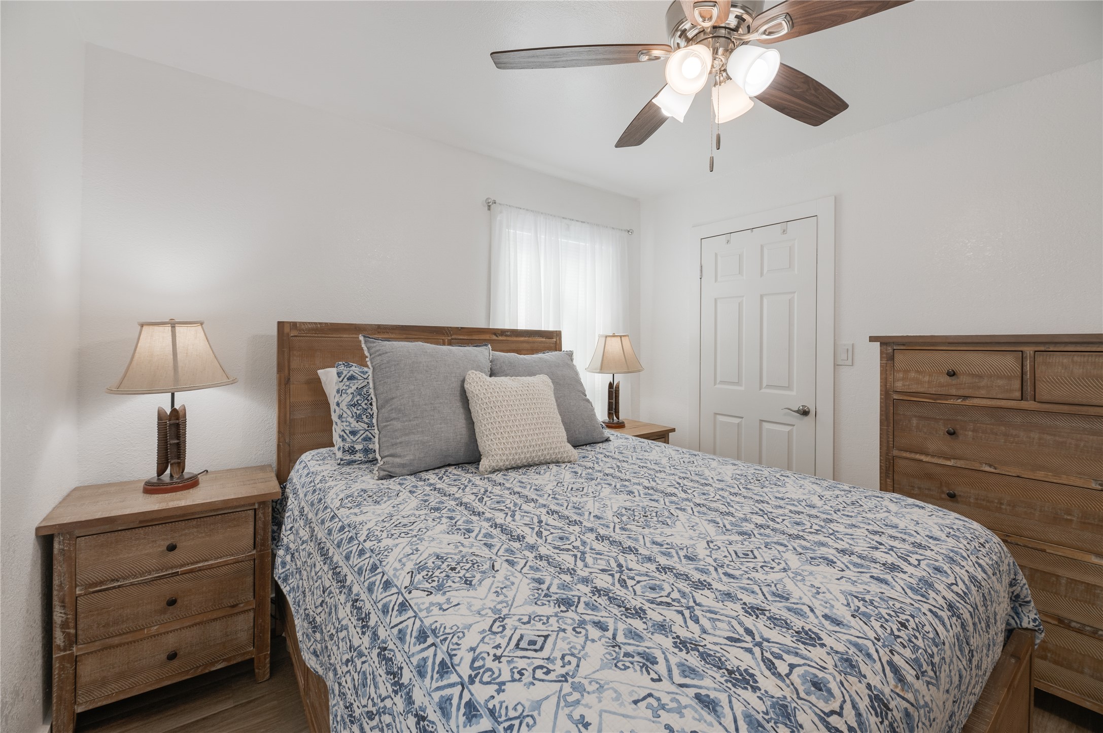445 West Vaughan Street Bertram, TX 78605 - Photo 7 of 23 a bedroom with a bed and a closet
