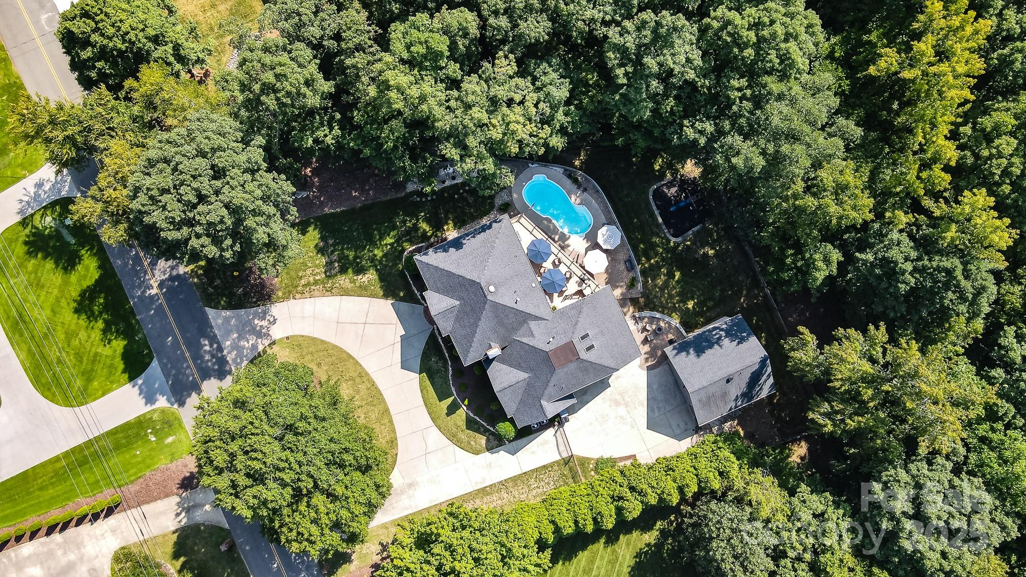 5300 Green Rea Road Charlotte, NC 28226 - Photo 2 of 42 an aerial view of a house with a yard and swimming pool