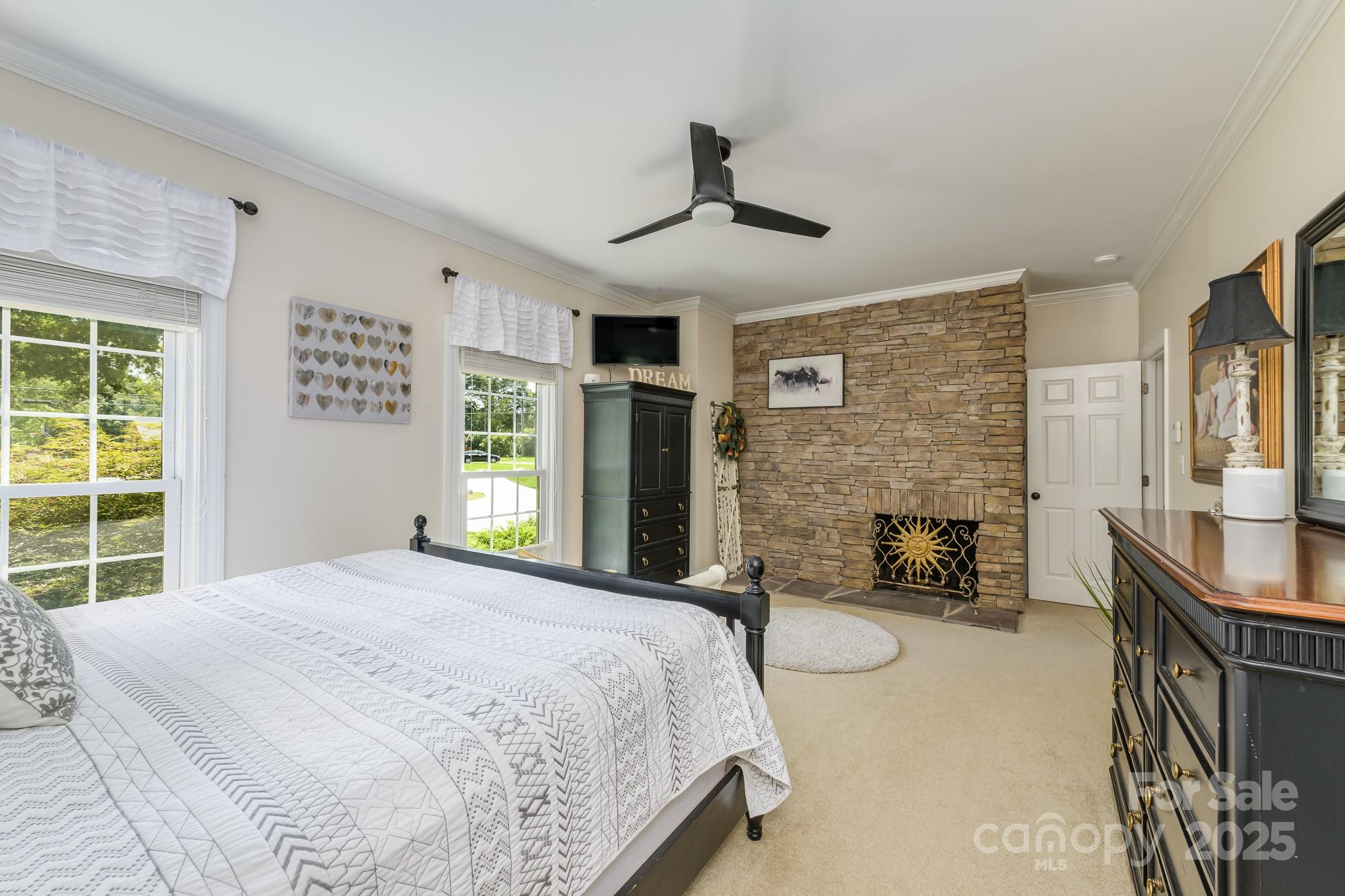 5300 Green Rea Road Charlotte, NC 28226 - Photo 23 of 42 a bedroom with a bed couch and window