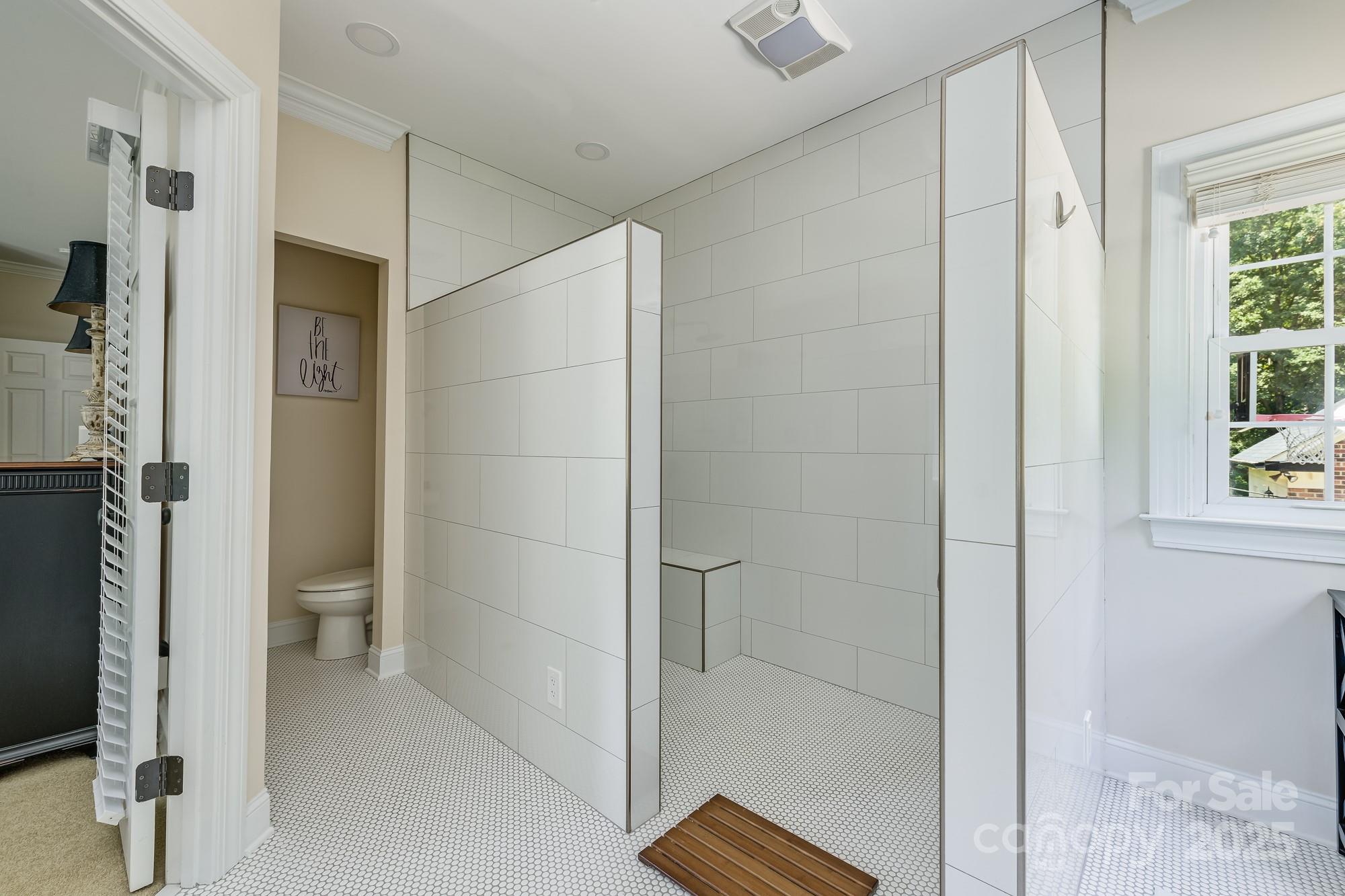 5300 Green Rea Road Charlotte, NC 28226 - Photo 25 of 42 a bathroom with a shower and a toilet