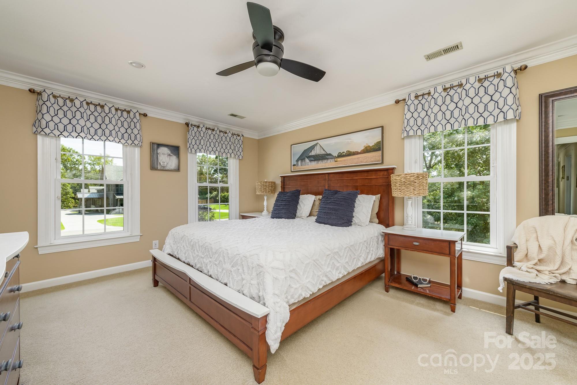 5300 Green Rea Road Charlotte, NC 28226 - Photo 26 of 42 a bed sitting in a spacious bedroom next to a window