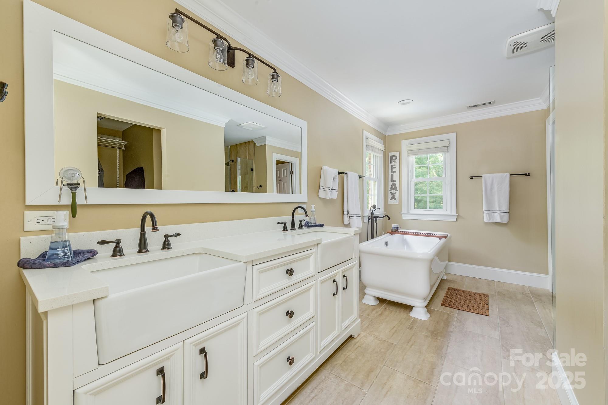 5300 Green Rea Road Charlotte, NC 28226 - Photo 28 of 42 a bathroom with a granite countertop sink mirror and a