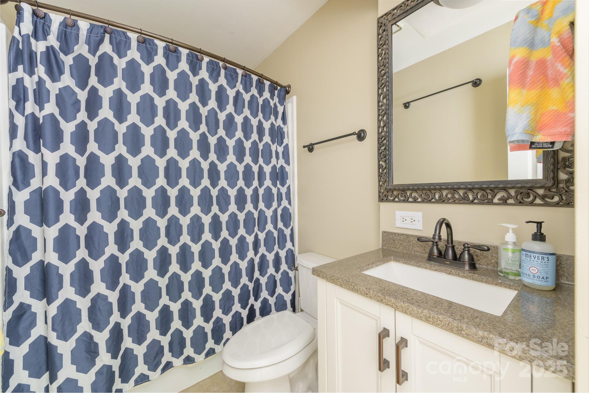 5300 Green Rea Road Charlotte, NC 28226 - Photo 35 of 42 a bathroom with a sink and a mirror