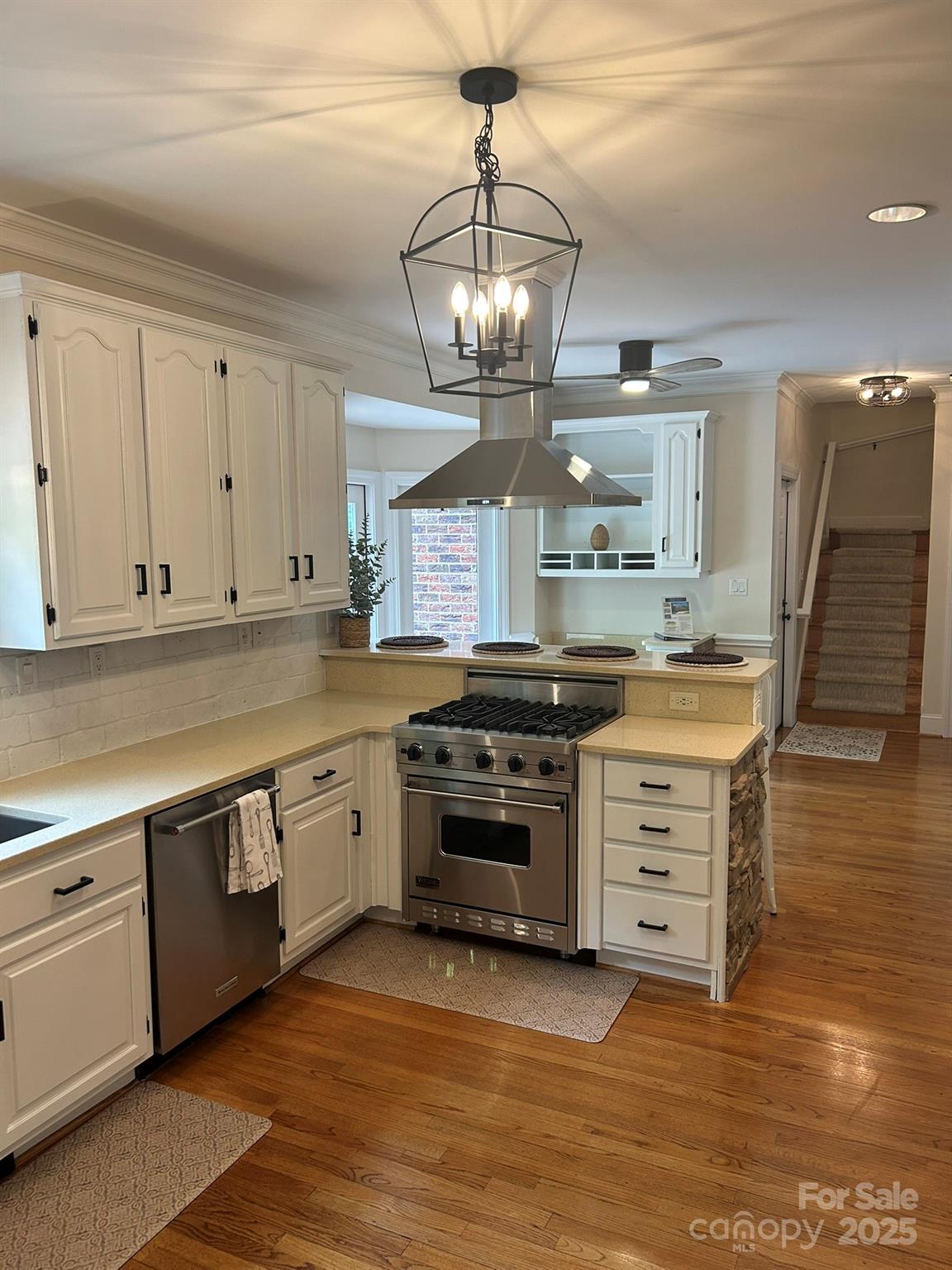 5300 Green Rea Road Charlotte, NC 28226 - Photo 8 of 42 a kitchen with stainless steel appliances granite countertop a stove and a sink