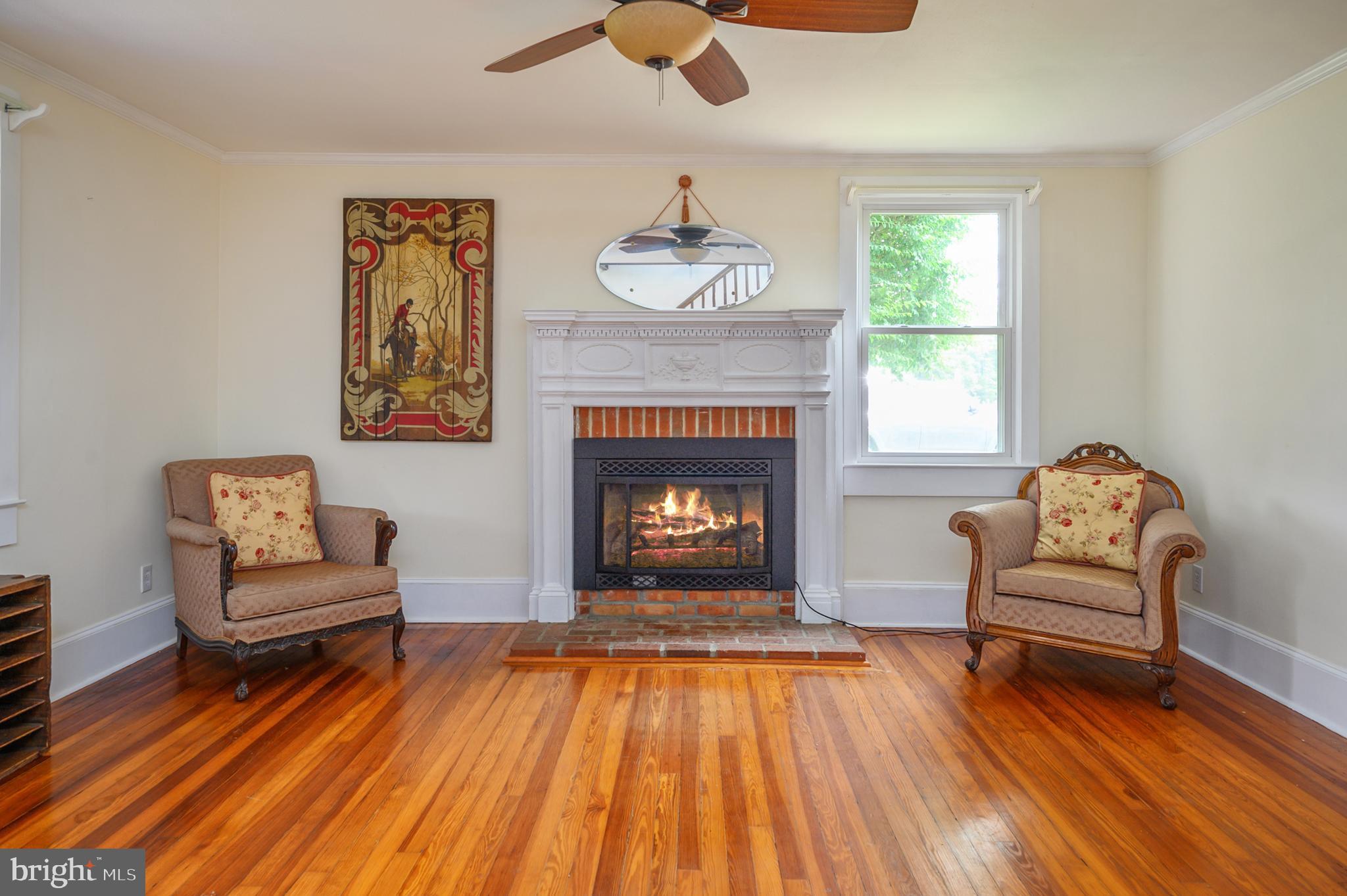 15390 Round Hill Road King George, VA 22485 - Photo 46 of 104 Gas fireplace w/gorgeous mantel and brick front!