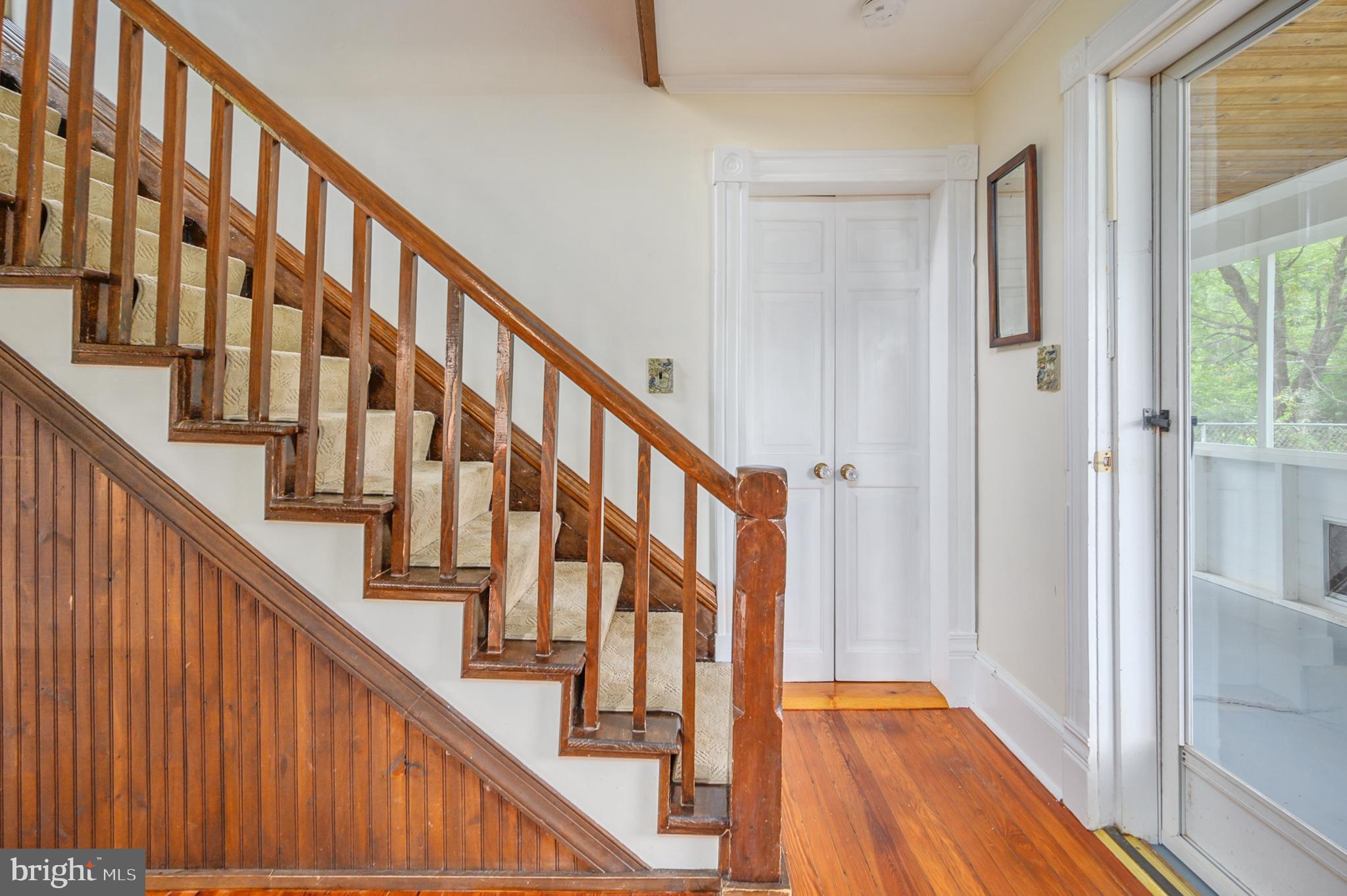15390 Round Hill Road King George, VA 22485 - Photo 50 of 104 The charm! Wainscotting, glass door knobs, stairs!