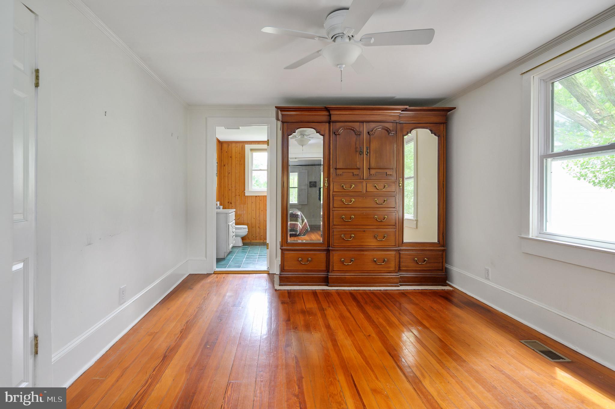 15390 Round Hill Road King George, VA 22485 - Photo 55 of 104 Spacious dining room w/wood flr & crown molding!