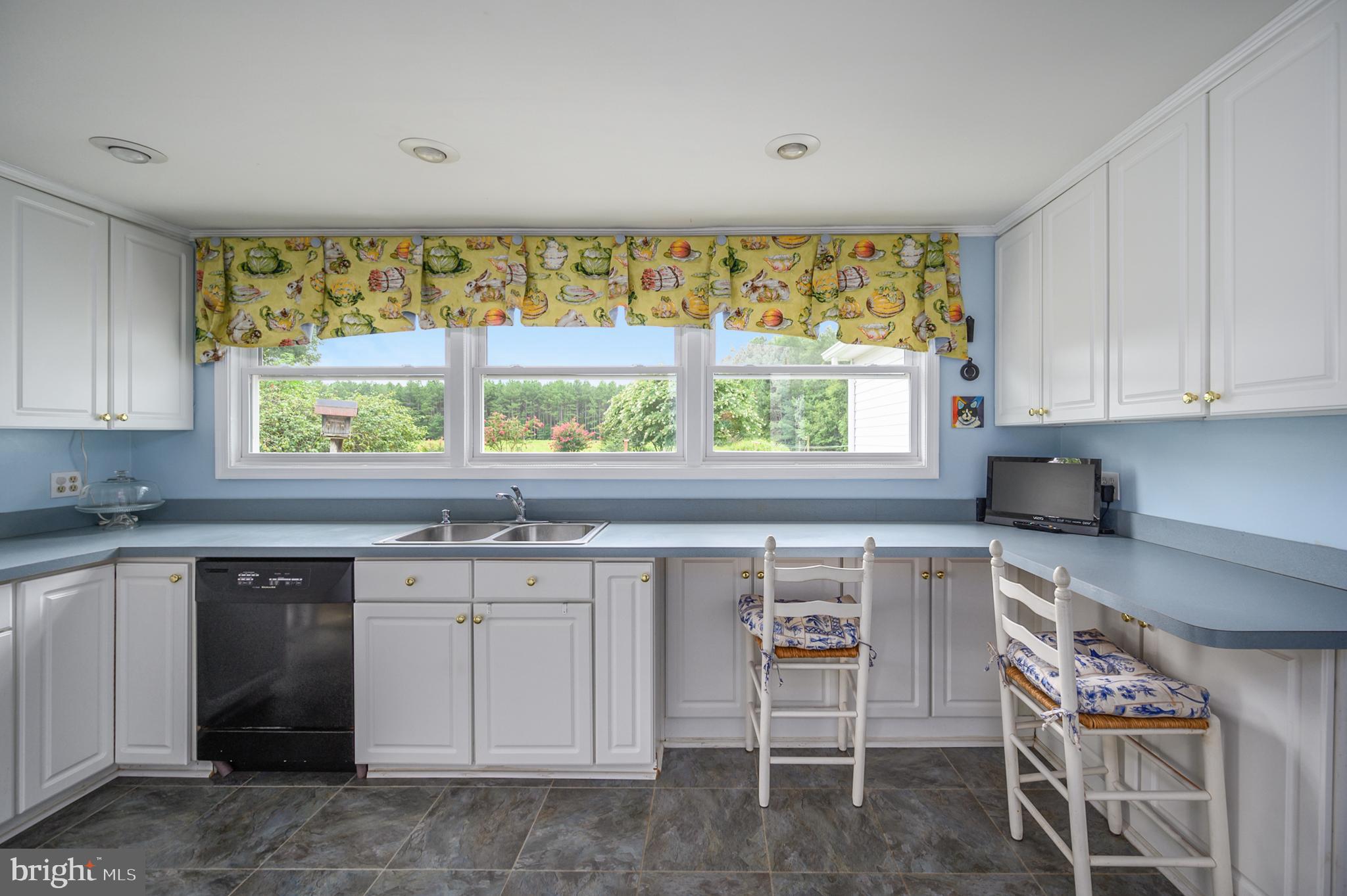 15390 Round Hill Road King George, VA 22485 - Photo 56 of 104 Updated kitchen with stool seating!