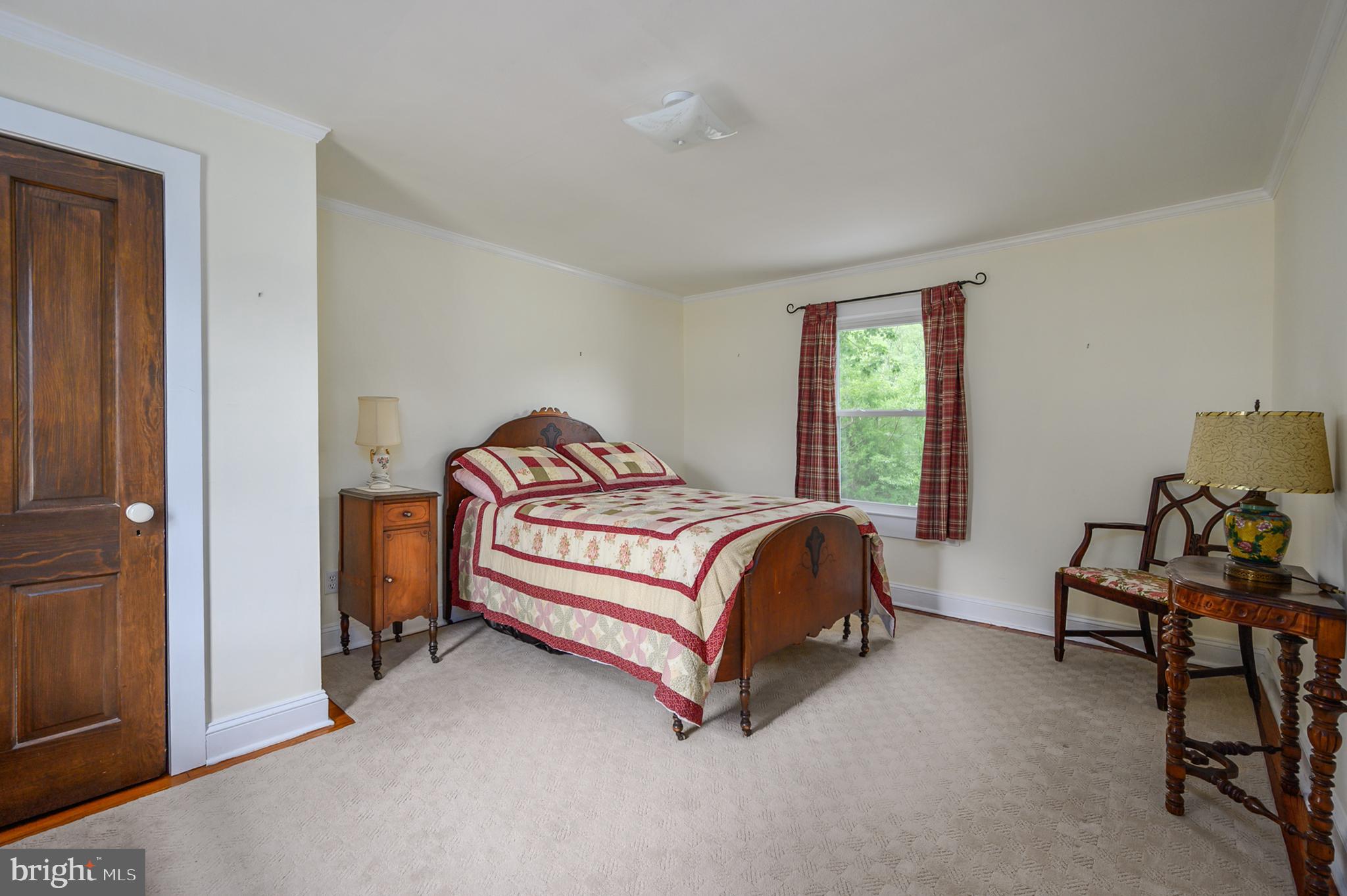 15390 Round Hill Road King George, VA 22485 - Photo 63 of 104 Spacious upstairs bedroom with wood floor!