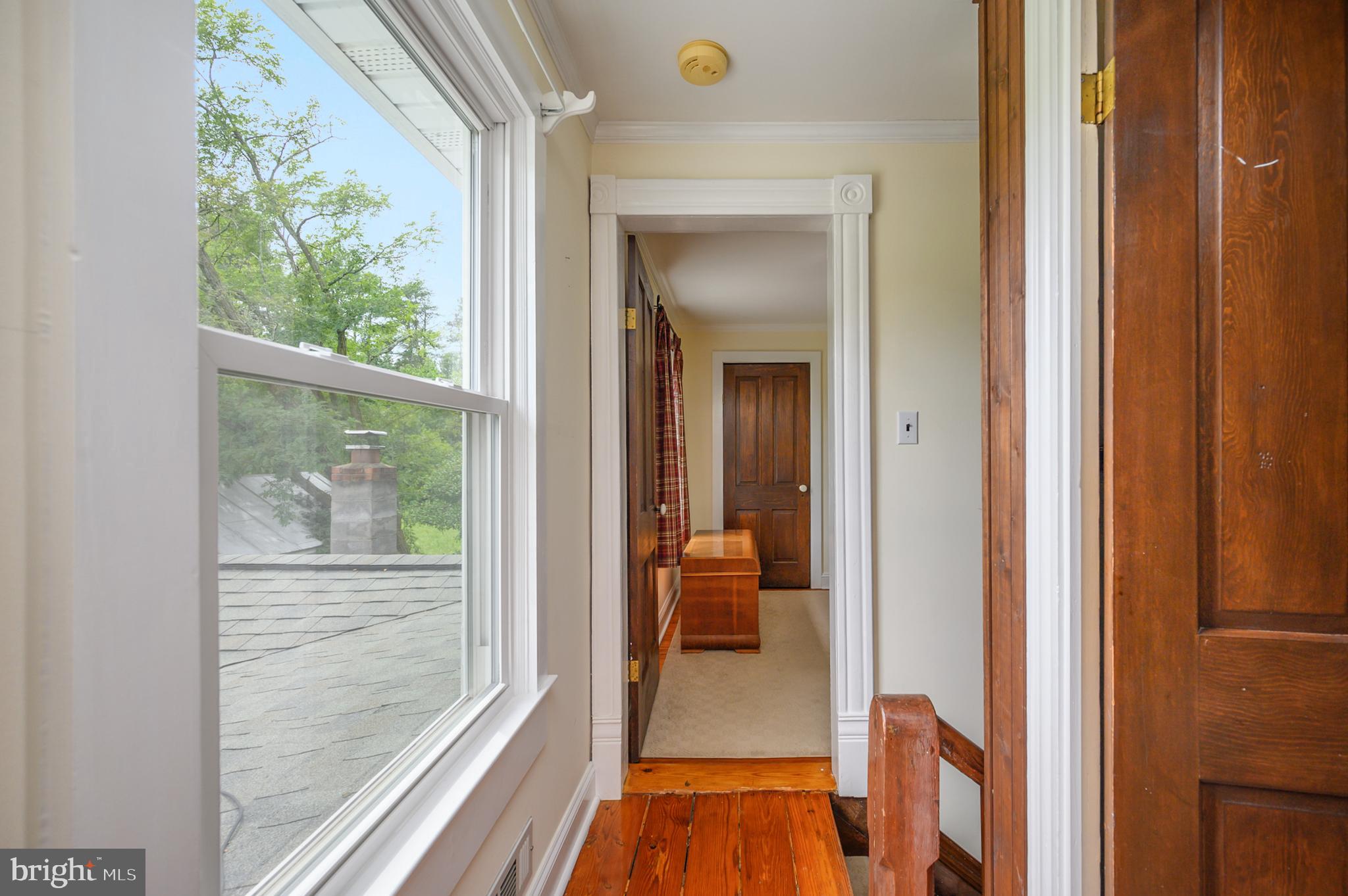 15390 Round Hill Road King George, VA 22485 - Photo 65 of 104 Hallway towards bedroom! Window has lovely view!