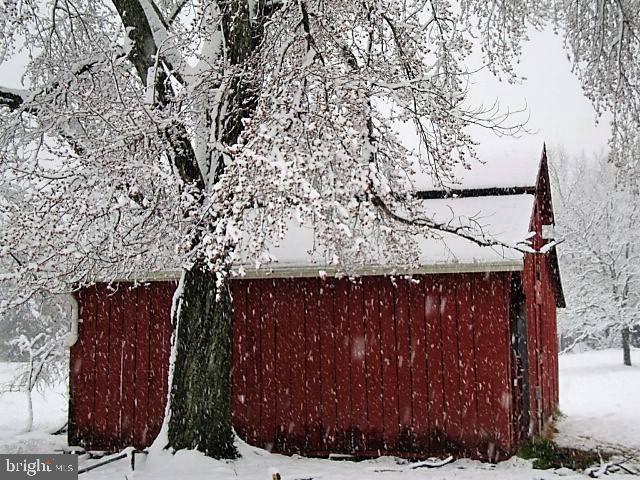 15390 Round Hill Road King George, VA 22485 - Photo 73 of 104 View of barn in the snow! How beautiful!