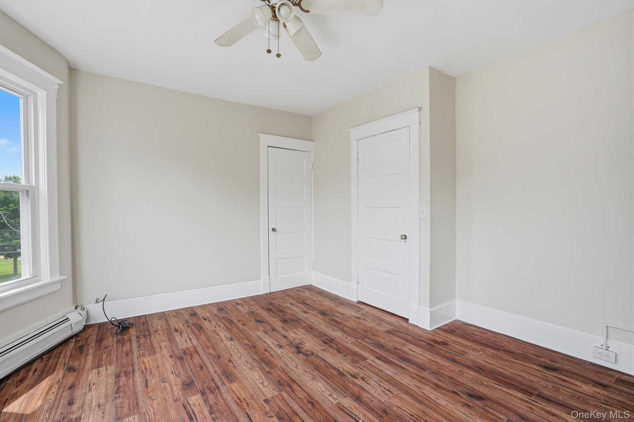 65 North Clinton Street Poughkeepsie, NY 12601 - Photo 32 of 43 a view of empty room with wooden floor and fan