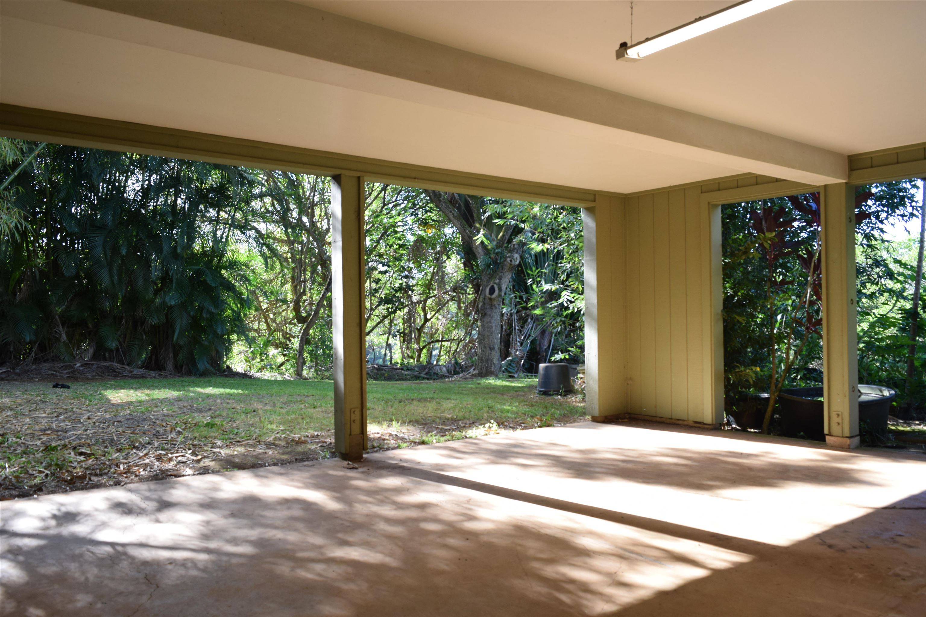 616 West Kuiaha Road Haiku, HI 96708 - Photo 6 of 30 a view of a house with backyard and balcony