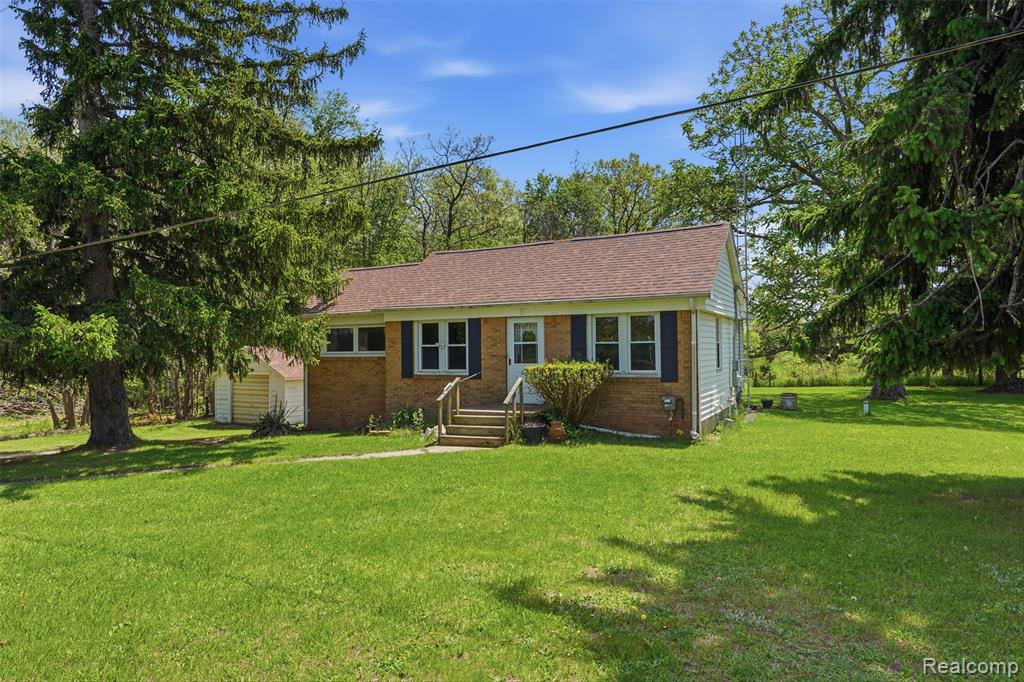 3405 West Coon Lake Road Howell, MI 48843 - Photo 1 of 36